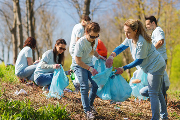 Sticker - volunteers with garbage bags cleaning park area