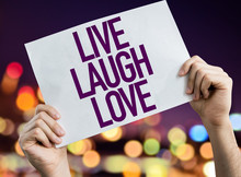 Love Laugh Love Placard With Bokeh Background