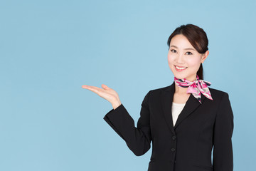 portrait of asian businesswoman isolated on blue background