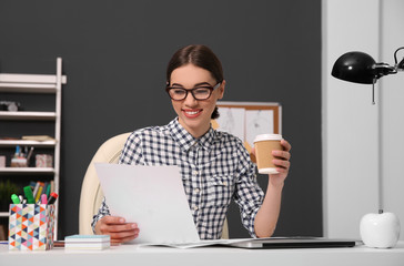 Sticker - Woman working with sketches at office