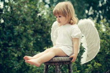 Wall Mural - Little boy dressed as angel