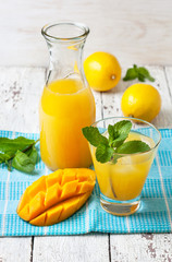 Canvas Print - mango ice tea with mint in a glass