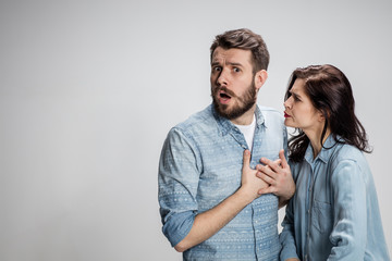 The young couple with different emotions during conflict