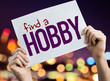 Find a Hobby placard with night lights on background