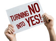 Turning No Into Yes placard isolated on white background