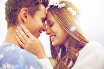 happy smiling young hippie couple outdoors