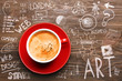 © Africa Studio - Cup of coffee on wooden table, top view. Start up concept