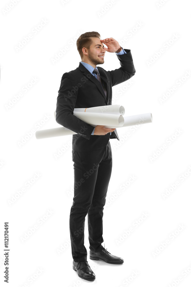 Man in suit holding engineering blueprints isolated on white