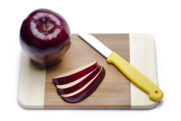 Wall Mural - knife cutting apples