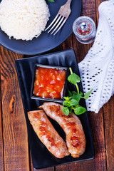 Wall Mural - boiled rice with sausages