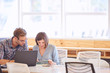 © nakophotography - business man and woman working together with copy space