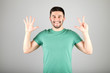 © Iurii - Man showing number by fingers