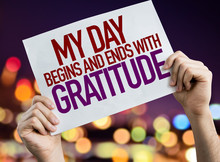 My Day Begins And Ends With Gratitude Placard With Night Lights On Background
