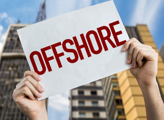 Offshore placard with urban background