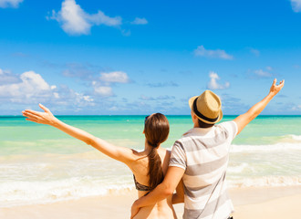 Couple Having Fun on Beautiful Sunny Beach.

