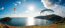 Paraglider Flying Over The Water
