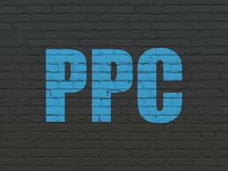 Marketing concept: PPC on wall background