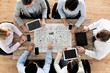 © Syda Productions - business team with scheme meeting at office