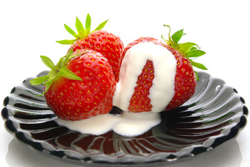 Wall Mural - Strawberry in sour cream on a white background