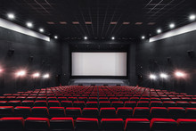 Empty Rows Of Red Theater Or Movie Seats. Chairs In Cinema Hall. Comfortable Armchair