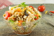 macaroni served with cheese vegetables and parsley