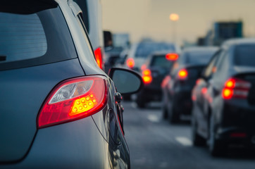 traffic jam with row of cars on expressway during rush hour