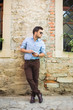 © zadorozhna - Urban business man talking on smart phone at walking.