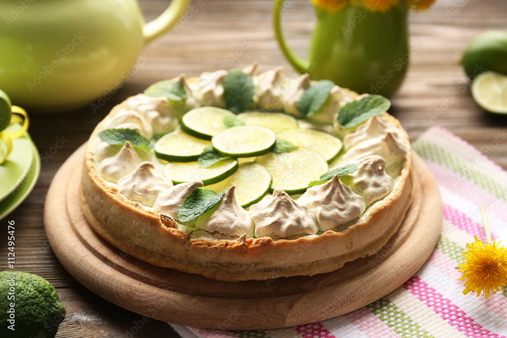 Tasty cake on wooden background