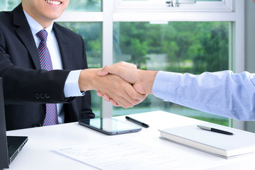 Wall Mural - Handshake of businessmen in the office