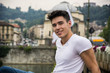 © theartofphoto - Attractive young man's in urban setting smiling