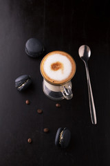 Wall Mural - Cup of coffee and  black makarons