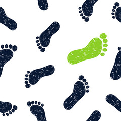 Foot prints seamless pattern. Vector background with doodle foot prints in black and green.