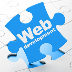 Web development concept: Web Development on puzzle background