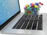 Fototapeta Tęcza - shopping cart with application software icons on laptop. 3d rendering.