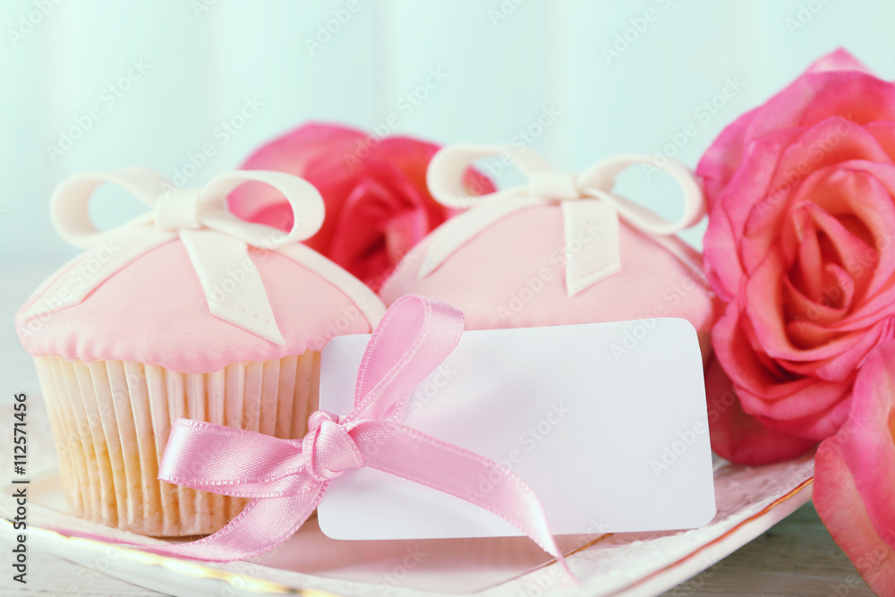 Happy Mother's day concept. Roses and cupcakes.