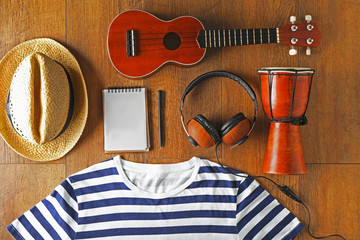 Wall Mural - Musician set on brown wooden background