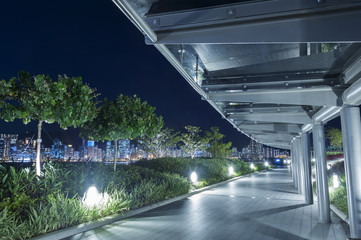 Aufkleber - Empty pedestrian walkway in the park at night