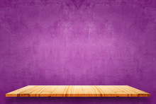 Empty Top Of Wooden Shelves And Purple Cement Wall Background.