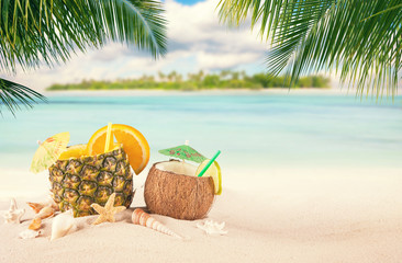 Sandy tropical beach with summer drinks