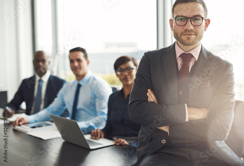 Fotografie, Obraz Handsome bearded professional sitting on desk