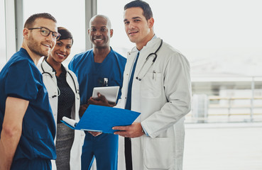 Doctors standing together looking relaxed