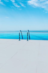 Poster - Infinity pool on the bright summer day