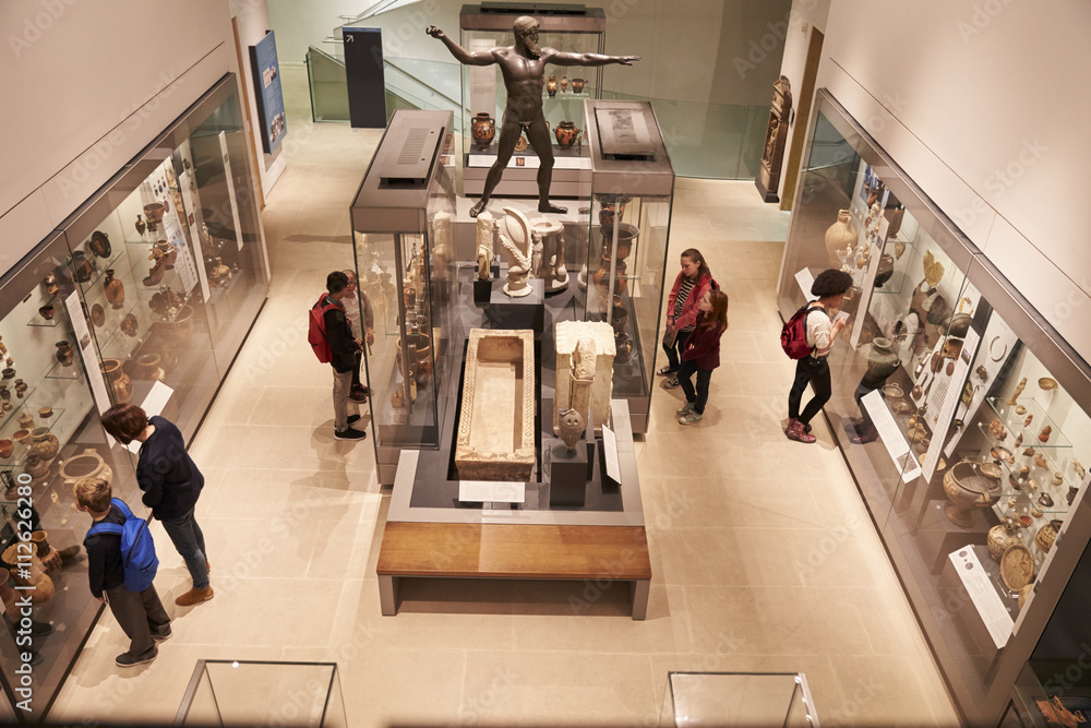Overhead View Of Busy Museum Interior With Visitors - obrazy, fototapety, plakaty 