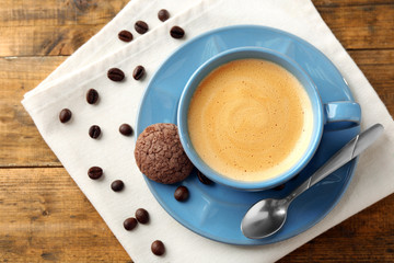 Poster - Cup of coffee with cookie on wooden table