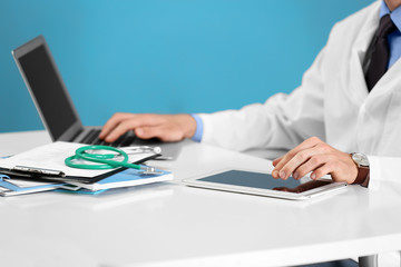 Poster - Doctor working on a tablet in hospital