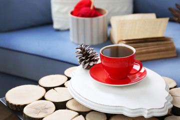 Poster - Cup of hot drink in living room. Comfortable winter weekend or holidays at home