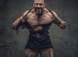 © Fxquadro - Huge bodybuilder rend his garments.