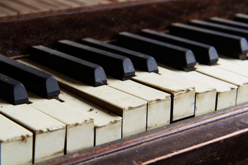 Wall Mural - Old broken disused piano with damaged keys