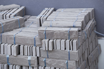 Canvas Print - pile of gray stone tiles prepare for install