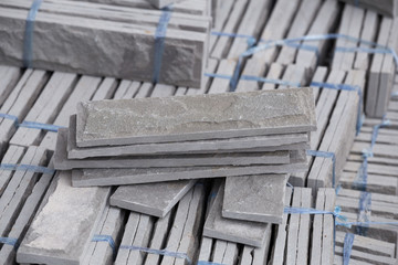 Canvas Print - pile of gray stone tiles prepare for install